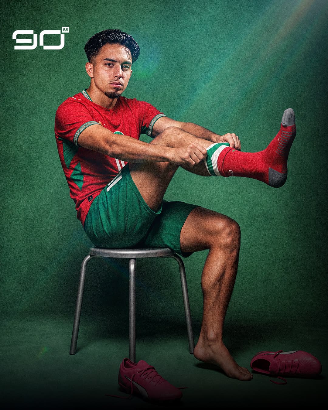 Morocco winger Ilias Akhomach wearing the Atlas Lions kit during a studio photoshoot.
