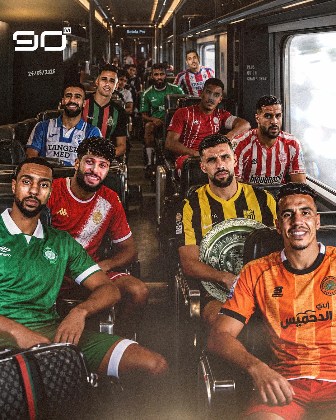 Botola Pro players from several Moroccan clubs pictured together inside a train to mark the start of the 2026/27 Moroccan league season.